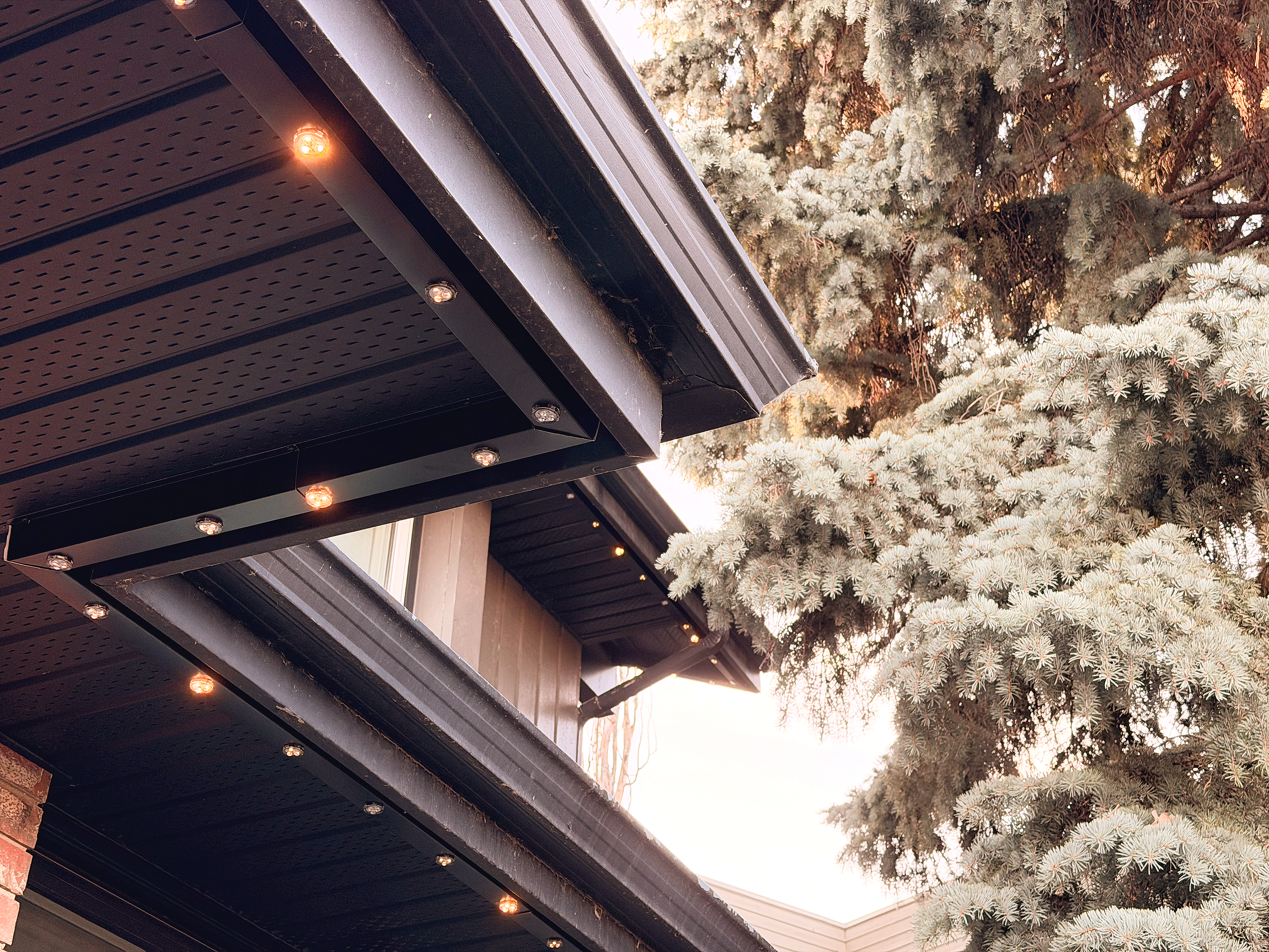 Soft LED accent lights highlighting architectural details on a Calgary home